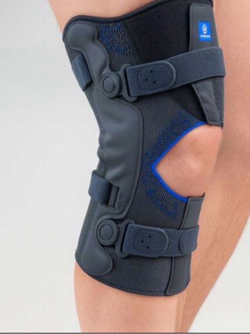 New Thuasne Genu Ligaflex Adjustable Black Neoprene Knee Brace with Blue Trim